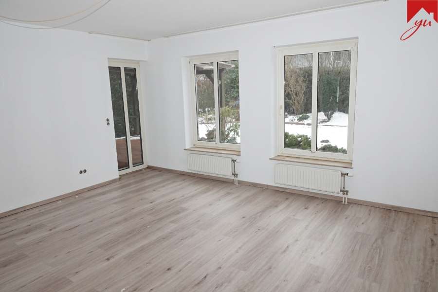 Wohnzimmer mit Zugang zur Terrasse