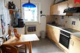 Whg. 2 Küche mit Einbauküche - Attraktive Kapitalanlage: Vierparteienhaus in begehrter, stadtnaher Lage von Aurich!