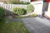 Whg. 1 Terrasse mit kleinem Gartenanteil - Attraktive Kapitalanlage: Vierparteienhaus in begehrter, stadtnaher Lage von Aurich!