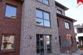 Außenansicht Eingangsbereich I - Gemütliche Obergeschosswohnung in Wiesmoor. Neubau- Erstbezug!