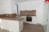 Einbauküche - Wunderschöne helle Obergeschosswohnung in Esens. Neubau Erstbezug!