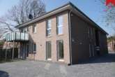 Aussenansicht - Wunderschöne helle Obergeschosswohnung in Esens. Neubau Erstbezug!