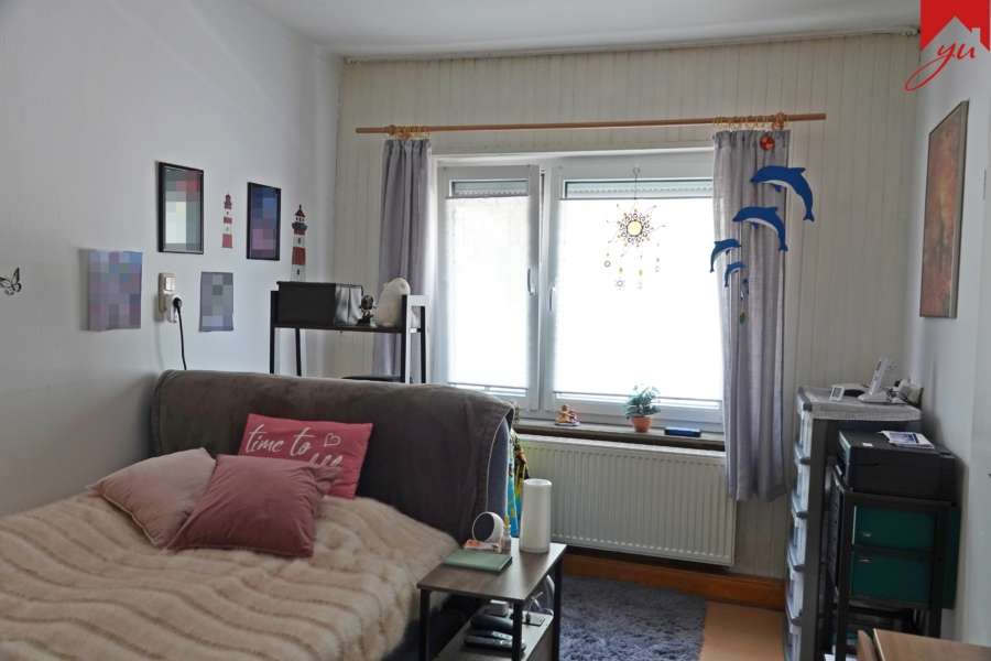 Schlafzimmer in der Einliegerwohnung Bild II