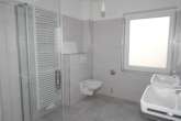 Badezimmer - Helle Erdgeschosswohnung mit Terrasse in Wiesmoor – Neubau- Erstbezug!