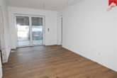 Wohn- und Essbereich - Schöne Neubauwohnung mit Terrasse in zentraler Lage von Schortens! Neubau- Erstbezug