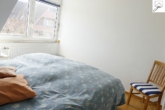Schlafzimmer Bild II - Gemütliche Obergeschosswohnung auf der ostfriesischen, autofreien Urlaubsinsel Baltrum!