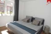 Schlafzimmer Bild II - Neubau- Erdgeschosswohnung mit 3 Zimmern in Küstennähe. Optimal als Kapitalanlage oder zur Eigennutzung.