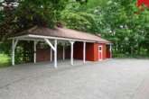 Carport mit Geräteschuppen sowie Mülltonnenstellplatz