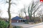 Straßenansicht - Kapitalanleger und / oder Selbstnutzer aufgepasst: Doppelbungalow in ruhiger Lage von Aurich – Egels!