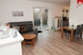 Wohnzimmer I 26C - Kapitalanleger und / oder Selbstnutzer aufgepasst: Doppelbungalow in ruhiger Lage von Aurich – Egels!