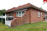 Außenansicht Terrasse - Eine seltene Gelegenheit im Ortskern von Westerholt: Ebenerdiger Bungalow auf pflegeleichtem Grundstück!