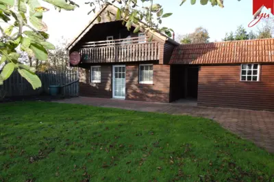 Natürlich wohnen, Ruhe genießen – Charmantes Holzhaus mit Weitblick in Großheide, 26532 Großheide, Haus