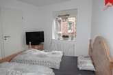 Whg. 1: Schlafzimmer Bild II - Modernes, gut vermietetes Sechsfamilienhaus sowie geräumige Lagerfläche im Ortskern von Werdum.