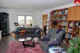 Whg. 6: Wohnzimmer Bild II - Modernes, gut vermietetes Sechsfamilienhaus sowie geräumige Lagerfläche im Ortskern von Werdum.