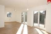 heller Wohn- und Essbereich - Moderne Erdgeschosswohnung in guter Lage von Wiesmoor! Neubau- Erstbezug