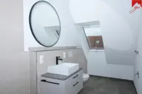 Badezimmer mit Waschmaschinenanschluss