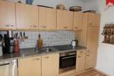 Einbauküche - Gemütliche Erdgeschosswohnung in absolut ruhiger aber dennoch zentraler Lage von Aurich mit Gartengrundstück.