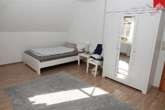 Zimmer II im Obergeschoss  Bild II - Hochwertiges, ansprechendes Ein-/ Zweifamilienhaus mit PV- und Solaranlage in Dornum- Schwittersum!