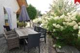 Terrasse - Hochwertiges, ansprechendes Ein-/ Zweifamilienhaus mit PV- und Solaranlage in Dornum- Schwittersum!