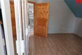 Ankleidezimmer Bild II im Obergeschoss - Hochwertiges, ansprechendes Ein-/ Zweifamilienhaus mit PV- und Solaranlage in Dornum- Schwittersum!