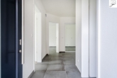 Eingangsbereich - Schicke Erdgeschosswohnung mit durchdachter Raumaufteilung im Neubaugebiet von Oldenburg- Eversten.