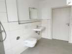 Badezimmer I - Ebenerdige Wohnung im schicken Neubauobjekt in guter Innenstadtlage. Für Mieter mit WBS!