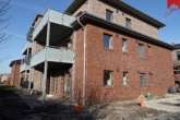 Außenansicht - Einladende Obergeschosswohnung in Wiesmoor. Neubau- Erstbezug!