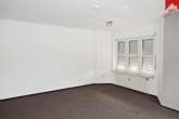 Wohnzimmer Bild III - Solide Obergeschosswohnung in guter Lage zur Innenstadt!