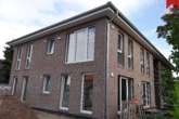 Außenansicht Obergeschosswohnung - Ansprechende und hochwertige 3-Zimmer-Obergeschosswohnung mit Einbauküche am Stadtrand von Esens!