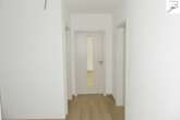 Flur - Seniorengerechte Erdgeschosswohnung im neuwertigen und modernen Mehrfamilienhaus mit guter Mieterstruktur!