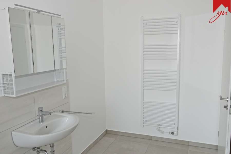 Moderne Neubau- Erdgeschosswohnung mit drei Zimmern in zentraler Lage von Esens - Foto 3