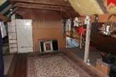 Abstellraum mit Zugang zum Schlafzimmer im OG - Liebevoll gepflegtes Einfamilienhaus mit wunderschön angelegtem Garten in Simonswolde