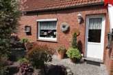 Hauseingang - Liebevoll gepflegtes Einfamilienhaus mit wunderschön angelegtem Garten in Simonswolde