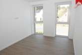 Büro - Großzügige moderne Obergeschosswohnung mit Einbauküche am Stadtrand von Esens! Neubau- Erstbezug!
