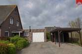 Haus mit Garage und Carport - Doppelhaushälfte mit 2 Wohneinheiten im küstennahen und gemütlichen Warfendorf Westerbur