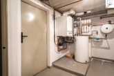 Heizungraum - Gepflegtes Einfamilienhaus mit einem Erweiterungsbau und viel Potenzial in eingewachsener Siedlungslage von Utarp