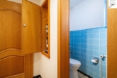 Gäste WC - Gepflegtes Einfamilienhaus mit einem Erweiterungsbau und viel Potenzial in eingewachsener Siedlungslage von Utarp