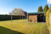 Garten - Gepflegtes Einfamilienhaus mit einem Erweiterungsbau und viel Potenzial in eingewachsener Siedlungslage von Utarp
