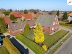 Außenansicht - Gepflegtes Einfamilienhaus mit einem Erweiterungsbau und viel Potenzial in eingewachsener Siedlungslage von Utarp