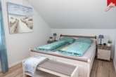 Schlafzimmer Bild I - Hochwertig eingerichte Eigentumswohnung mit Blick über die Felder in Lütetsburg!