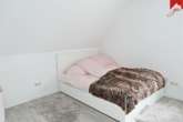Schlafzimmer - Renovierte Singlewohnung zum Wohlfühlen unweit der Auricher Innenstadt!