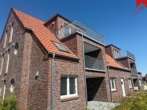 Außenansicht - Neubauwohnung mit hochwertiger Ausstattung und Mobiliar in Innenstadtlage von Esens