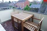 Balkon - Gemütliche Dachgeschosswohnung mit moderner Einbauküche in zentraler Lage von Aurich!