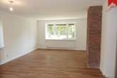 offenes Wohnzimmer - Renovierte Einliegerwohnung mit viel Platz und Garten in Plaggenburg!
