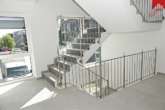 Treppenhaus - Hochwertige Dachgeschosswohnung mit Dachterrasse in Schortens. Erstbezug
