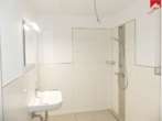 Badezimmer - Moderne 2- Zimmer- Neubauwohnung in Aurich. Für Interessenten mit WBS.