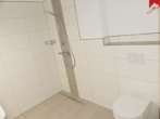 Badezimmer mit ebenerdiger Dusche - Moderne 2- Zimmer- Neubauwohnung in Aurich. Für Interessenten mit WBS.
