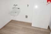 angrenzender HWR mit Waschmaschinenanschluss - Moderne 2- Zimmer- Neubauwohnung in Aurich. Für Interessenten mit WBS.
